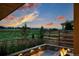 Outdoor fire pit area overlooking a scenic landscape, creating a serene and inviting atmosphere at 740 Meadowlark Dr, Erie, CO 80516