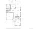 First floor plan featuring a kitchen, living room, dining area, garage, and outdoor deck at 740 Meadowlark Dr, Erie, CO 80516