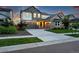 Charming two-story home featuring a well-manicured lawn, a two-car garage, and a welcoming entrance at 740 Meadowlark Dr, Erie, CO 80516