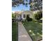 Charming home with a well-manicured lawn, decorative accents, and inviting curb appeal at 4780 Milwaukee St, Denver, CO 80216