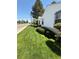 Well-kept lawn with lush greenery, showcasing the property's landscaping and exterior at 4780 Milwaukee St, Denver, CO 80216