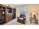 Bedroom with carpet and brown leather recliner, next to window at 4780 Milwaukee St, Denver, CO 80216