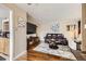 Comfortable living room showcasing wood floors and a large brown leather sofa at 4780 Milwaukee St, Denver, CO 80216