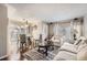 Inviting living room with hardwood floors and ample natural light at 4780 Milwaukee St, Denver, CO 80216