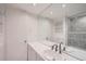 Bright bathroom featuring a large mirror, shower, and modern finishes at 888 N Logan St # 4A, Denver, CO 80203