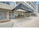 Inviting building entrance with covered walkway and glass doors to welcome residents and guests at 888 N Logan St # 4A, Denver, CO 80203