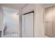 Bright kitchen showcasing a white refrigerator and a glimpse into the adjacent living space at 888 N Logan St # 4A, Denver, CO 80203
