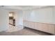 Living space with built-in storage and an open kitchen, great for entertaining at 888 N Logan St # 4A, Denver, CO 80203