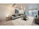 Cozy living room with plush seating and a balcony overlooking the city at 888 N Logan St # 4A, Denver, CO 80203