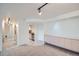 Well-lit living room featuring built-in storage and an open view into the kitchen at 888 N Logan St # 4A, Denver, CO 80203