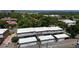 An elevated view of the property showing multiple garages and tidy landscaping at 663 S Xenon Ct, Lakewood, CO 80228