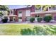 Charming townhome with well-maintained lawn and inviting curb appeal at 663 S Xenon Ct, Lakewood, CO 80228
