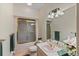 Well-lit bathroom featuring a vanity and a combined tub and shower at 24768 Foothills N Dr, Golden, CO 80401