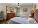 Bedroom featuring twin beds, dresser, and beautiful views at 24768 Foothills N Dr, Golden, CO 80401