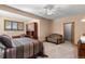 Comfortable bedroom featuring a sitting area and a bright window at 24768 Foothills N Dr, Golden, CO 80401