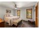 Bedroom featuring beautiful views and ceiling fan at 24768 Foothills N Dr, Golden, CO 80401