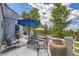 Relaxing outdoor deck furnished with comfortable seating and an umbrella at 24768 Foothills N Dr, Golden, CO 80401