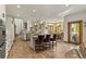 Spacious kitchen with an island and breakfast bar adjacent to the dining area at 24768 Foothills N Dr, Golden, CO 80401