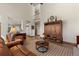 Spacious living area with high ceilings, hardwood floors, and comfortable leather sofas at 24768 Foothills N Dr, Golden, CO 80401