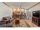Relaxing living room featuring a wet bar and comfortable seating area at 24768 Foothills N Dr, Golden, CO 80401