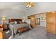 Bright main bedroom featuring vaulted ceiling, and access to the main house at 24768 Foothills N Dr, Golden, CO 80401