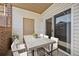 Cozy outdoor patio area with a dining table and chairs, perfect for enjoying outdoor meals or relaxing at 875 E 78Th Ave # 9-2, Denver, CO 80229
