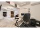A finished basement featuring a desk, bookcase and an adjacent media room at 4305 Red Rock Dr, Larkspur, CO 80118