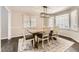 Formal dining room with natural light and a neutral color scheme at 4305 Red Rock Dr, Larkspur, CO 80118