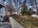 Well-maintained backyard with lawn and fence, providing privacy and outdoor space at 500 Lashley St # 58, Longmont, CO 80504