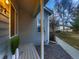 Comfortable front porch with modern plants, stylish gray siding, and meticulously kept landscaping at 500 Lashley St # 58, Longmont, CO 80504