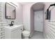 Stylish bathroom features subway tiles, updated fixtures, and a sleek design at 485 S Logan St # 10, Denver, CO 80209