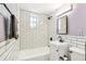 Modern bathroom featuring subway tiles, updated fixtures, and a sleek design at 485 S Logan St # 10, Denver, CO 80209