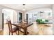 Open-concept dining area leading to the living room, creating an inviting space at 485 S Logan St # 10, Denver, CO 80209