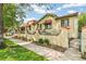 Charming row of apartments with red awnings, offering a classic aesthetic and street view at 485 S Logan St # 10, Denver, CO 80209