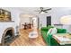 Inviting living room featuring a fireplace, hardwood floors, and an open concept layout at 485 S Logan St # 10, Denver, CO 80209
