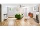 Bright living room with hardwood floors, ample natural light, and a cozy atmosphere at 485 S Logan St # 10, Denver, CO 80209