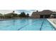 Large community swimming pool with multiple lanes and ample deck space for lounging at 16063 E 106Th Ct, Commerce City, CO 80022