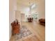 Bright dining area featuring a high ceiling, pendant lighting and a bay window at 16063 E 106Th Ct, Commerce City, CO 80022
