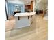 Open kitchen area featuring a spacious island, wood cabinets, and stainless steel appliances at 16063 E 106Th Ct, Commerce City, CO 80022
