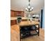 Kitchen with island, appliances and plenty of cabinet space at 16063 E 106Th Ct, Commerce City, CO 80022