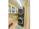 Laundry room with stacked washer and dryer at 16063 E 106Th Ct, Commerce City, CO 80022