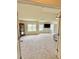 This main bedroom has lots of natural light, a ceiling fan, and neutral carpet at 16063 E 106Th Ct, Commerce City, CO 80022