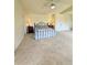 Large main bedroom with a comfy queen bed, soft carpeting and two closets for storage at 16063 E 106Th Ct, Commerce City, CO 80022