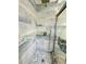 Stunning walk-in shower featuring custom tile work, a rainfall showerhead and modern fixtures at 16063 E 106Th Ct, Commerce City, CO 80022