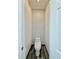 This clean toilet room features dark wood-style flooring at 16063 E 106Th Ct, Commerce City, CO 80022