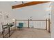 Cozy loft area with desk, chair, and exposed beam at 2363 Ranch Dr, Westminster, CO 80234