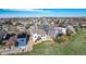 Aerial view of the property showcasing a well-maintained backyard and the surrounding neighborhood at 10233 Silver Maple Cir, Highlands Ranch, CO 80129