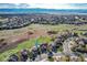 Expansive aerial view of the neighborhood highlighting proximity to parks and open spaces at 10233 Silver Maple Cir, Highlands Ranch, CO 80129