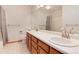 Functional bathroom with double sinks and classic fixtures at 10233 Silver Maple Cir, Highlands Ranch, CO 80129