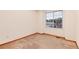 This bedroom has natural light with a neutral carpet at 10233 Silver Maple Cir, Highlands Ranch, CO 80129